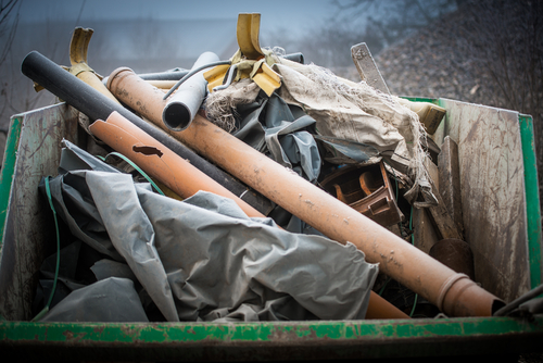 truck filled with old construction supplies and debris