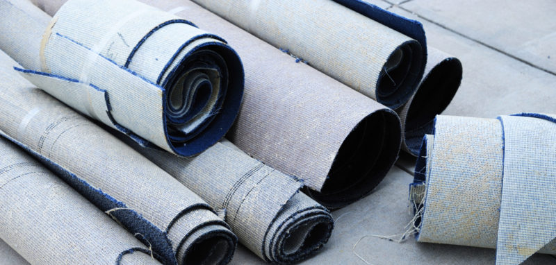 Carpet and other construction debris that needs junk removal in Modesto, CA